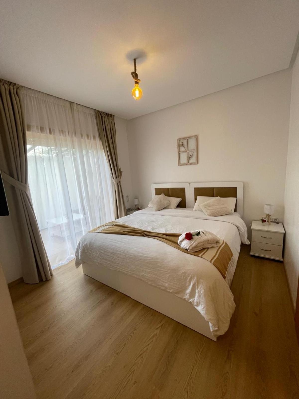 Appartement De Luxe Avec Jardin Vue Sur La Piscine Golf Securise 24H Sur 24 A 5 Minutes De L Aeroport マラケシュ エクステリア 写真